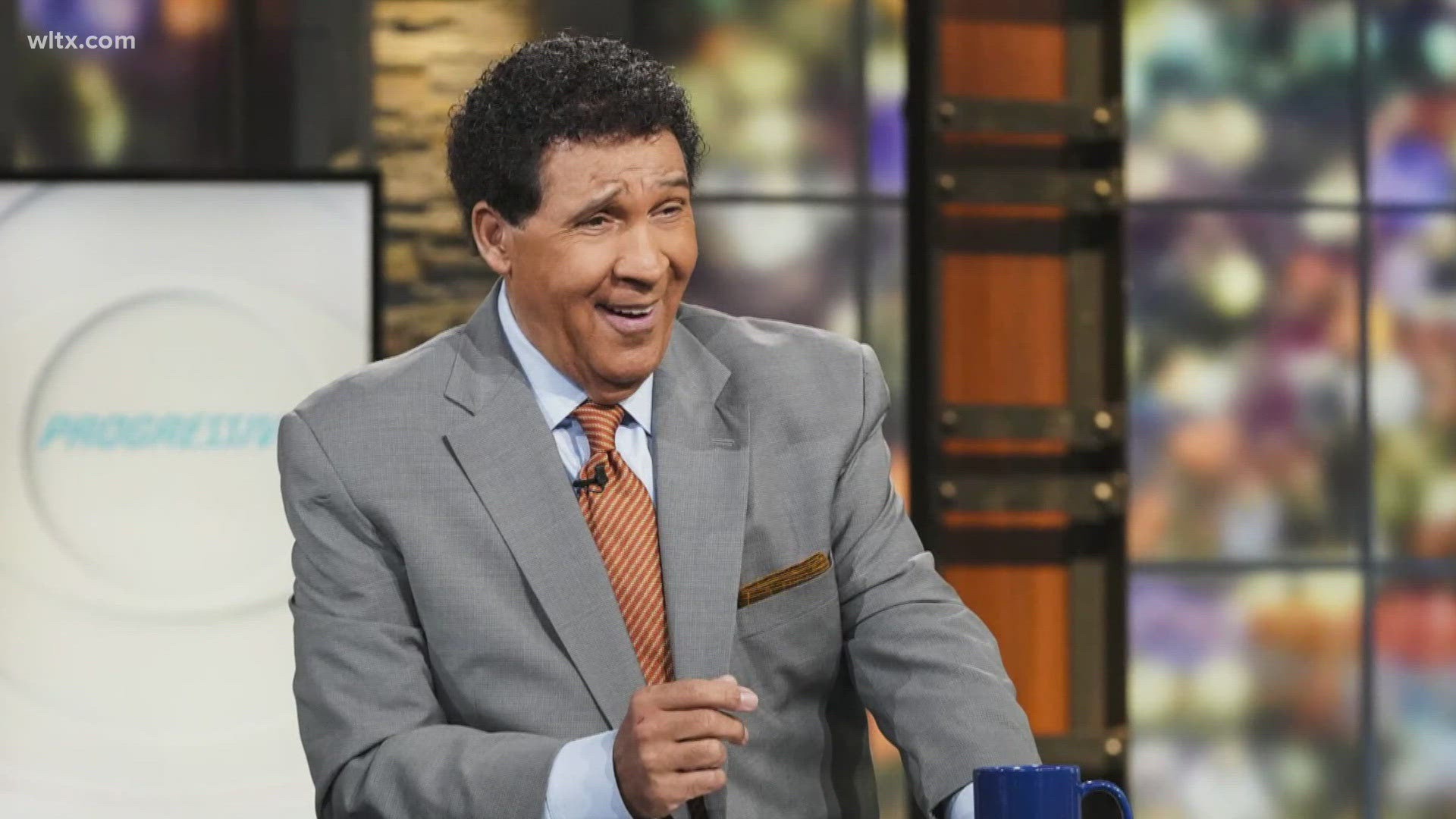 Greg Gumbel in a CBS Sports studio during a live broadcast