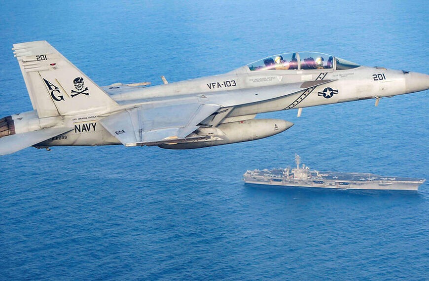 U.S. Navy jet over the Red Sea, highlighting the friendly fire incident with a missile cruiser.