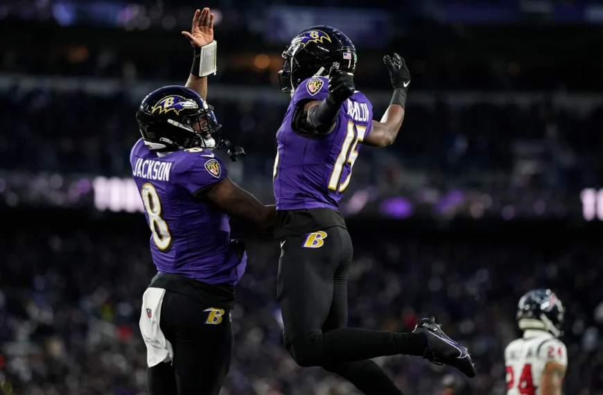 Lamar Jackson celebrating a touchdown during the AFC Divisional Playoff game against the Houston Texans.