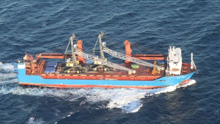 A sinking cargo ship in the Mediterranean Sea with rescue operations underway