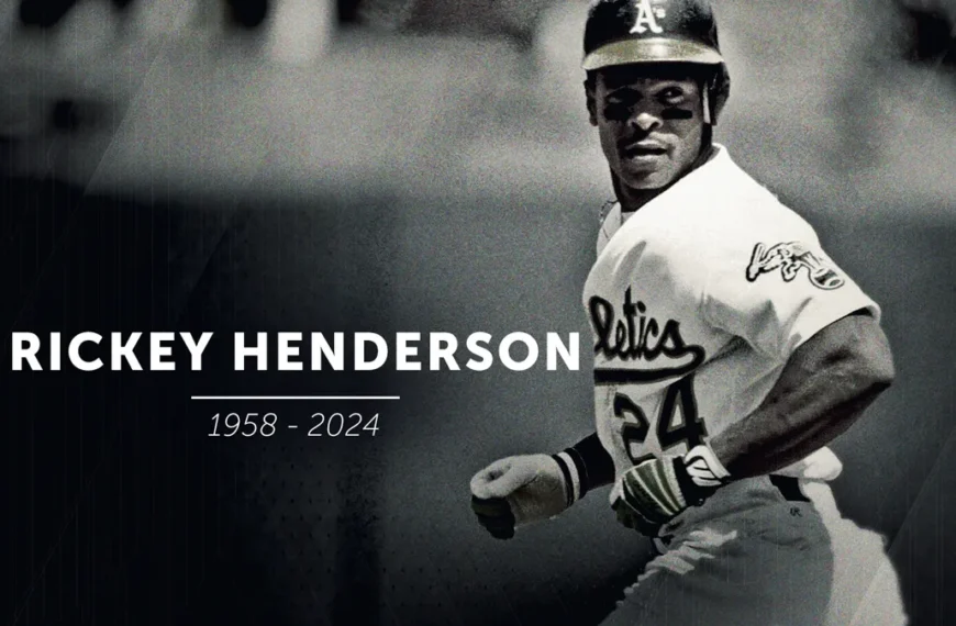 Rickey Henderson celebrates during a game, embodying his legacy.